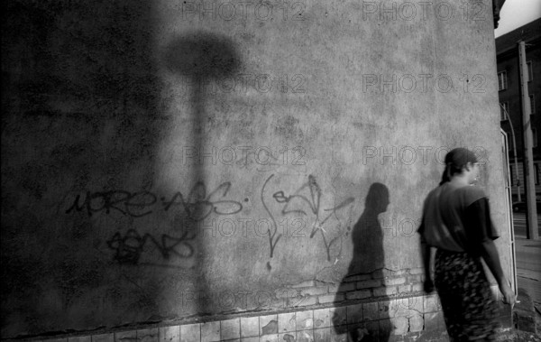 Germany, Berlin, 2.8.1992, street corner, lantern, person