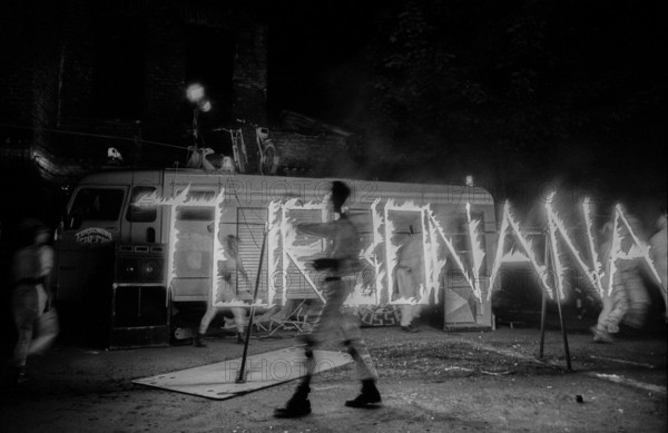 Germany, Berlin, 1.8.1992, fire artist, performing in the courtyard of the occupied building at Auguststraße 4