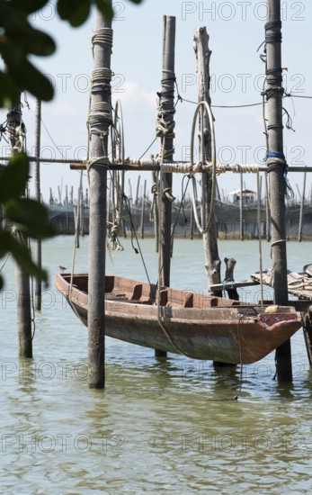 Thailand, Songkhla, Koh Yo, Aquacultural farm, Freshwater fish farming, Long-tailed boat out of water