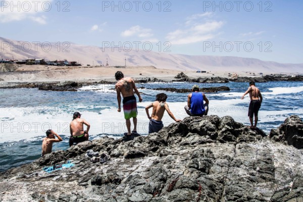 Group of people at Los Verdes Beach (Playa los Verdes). Iquique, Tarapaca Region, Chile. 19.11.15