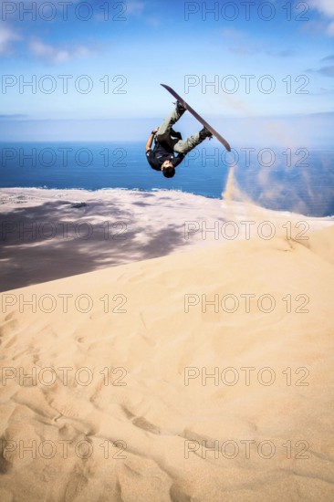 Sandboarding in Alto los Verdes, in Atacama Desert. Iquique, Tarapaca Region, Chile. 19.11.15