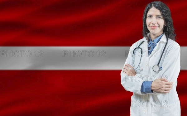 Latvian medicine and healthcare concept. Close up of doctor against Latvia flag background