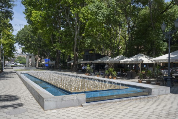 Modern fountain in a tree-lined men's alley with cafes, fountain in Shahumyan Park, 2750th Anniversary Park, Yerevan, Yerevan, Yerevan, Yerevan, Armenia