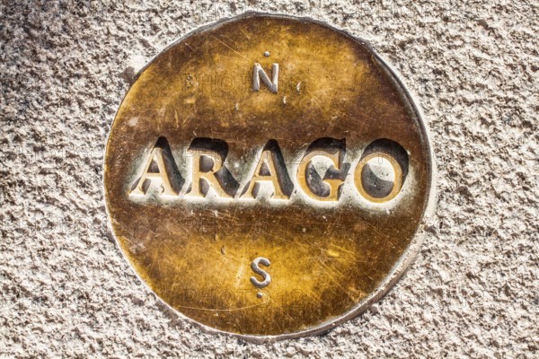 One of the Arago medallions at Louvre Museum (Musee du Louvre) defining the Rose Line, a fictional name given to the Paris Meridian and to the sunlight line defining the exact time of Easter on the Gnomon of Saint-Sulpice, marked by a brass strip on the floor of the church in the Priory of Sion mythology, where the two are conflated. Paris, France. 01.01.13