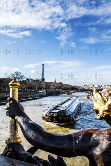 Detail of Pont Alexandre III (Alexandre III Bridge) and Eiffel Tower in the background. Paris, France. 01.01.13