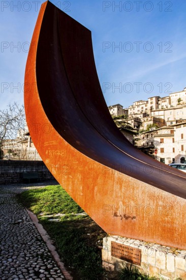 Sculpture in Piazza San Pietro, called Ascension. Assisi, Province of Perugia, Italy. 22.12.2012