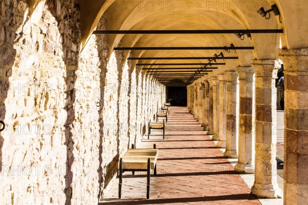 Passage with arches at Basilica of San Francesco d'Assisi. Assisi, Province of Perugia, Italy. 22.12.2012
