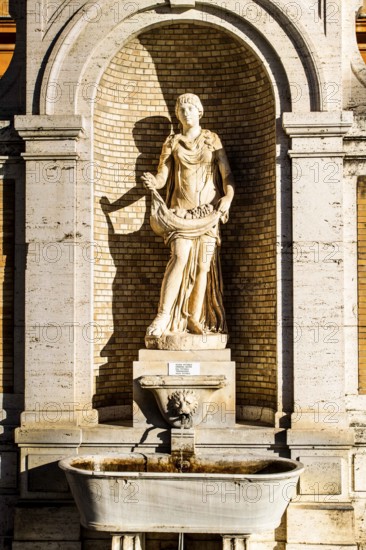 Statue in Belvedere Courtyard (Cortile del Belvedere) in Vatican Museum. Vatican City, Vatican City State. 28.12.2012