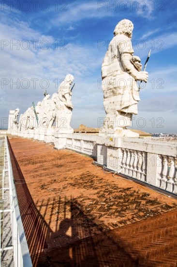 Apostle statues on the roof of Basilica of Saint Peter. Vatican City, Vatican City State. 27.12.2012