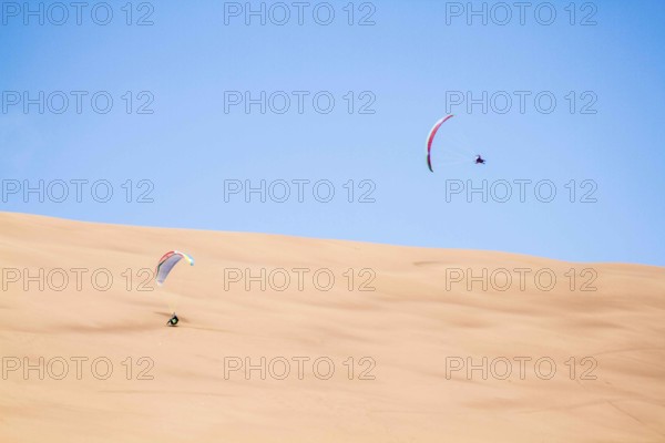 Paragliding at Atacama Desert. Iquique, Tarapaca Region, Chile