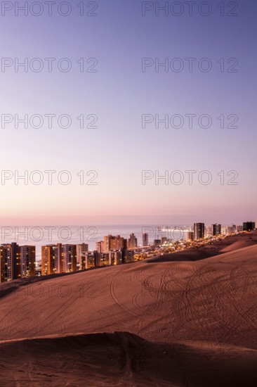 City of Iquique at dusk, viewed from Cerro Dragon. Iquique, Tarapaca Region, Chile. 15.11.15