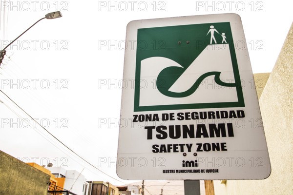 Sign indicating safe zone in case of tsunami. Iquique, Tarapaca Region, Chile. 16.11.15