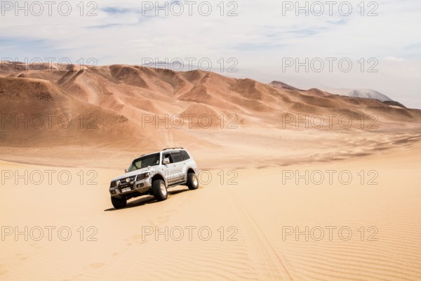 Car at Atacama Desert. Iquique, Tarapaca Region, Chile