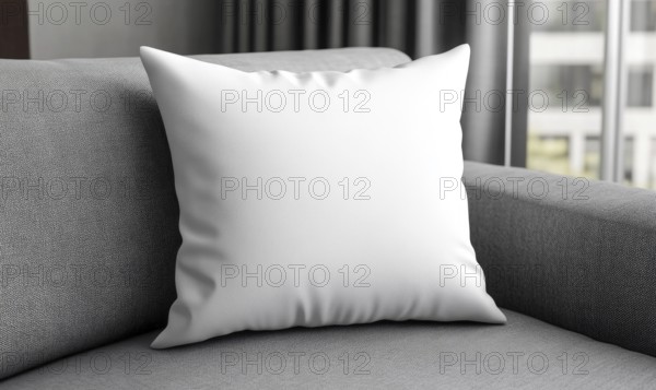 White pillow on a gray couch near a window with contemporary decor. AI generated