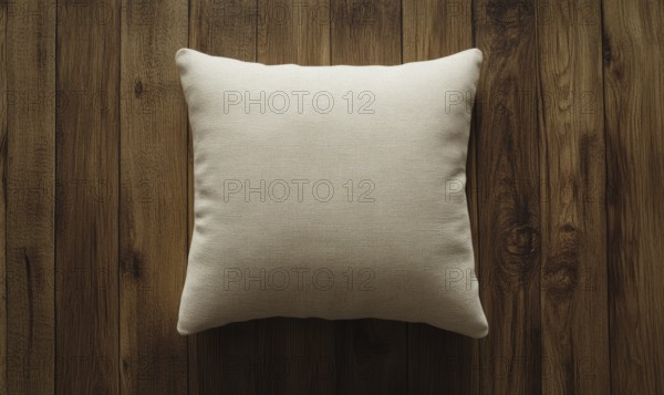 A white pillow sits on a wooden surface. The pillow is unmade and has a simple design. The wooden surface gives the pillow a rustic and natural feel. AI generated