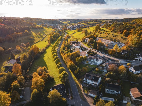 A hilly village with fields and trees in an autumn atmosphere, Deufringen, Aidlingen, Böblingen district, Germany