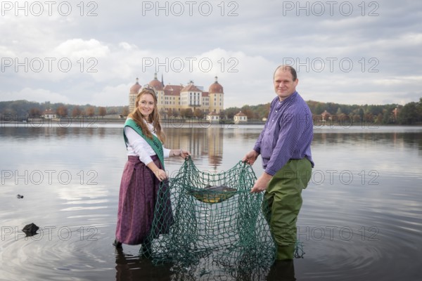 The new Saeschian fish queen Janine Rossol and Henry Lindner, managing director of Moritzburger Teichwirtschaft, at the press meeting for the 2025 Fish and Forest Festival, Moritzburg, Saxony, Germany
