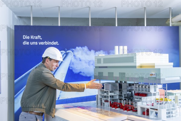 The Nossener Brücke CHP plant is a power plant in Dresden's Löbtau-Nord district that went into operation in 1995. The new building was built in 1993—1995 by Siemens AG with an electrical output of 270 megawatts and a district heating capacity of 455 megawatts and has been operated by Sachsenenergie ever since. The new power plant manager Martin Mallon. at the power plant model, Dresden, Saxony, Germany