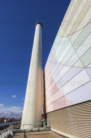 The Nossener Brücke CHP plant is a power plant in Dresden's Löbtau-Nord district that went into operation in 1995. The new building was built in 1993—1995 by Siemens AG with an electrical output of 270 megawatts and a district heating capacity of 455 megawatts and has been operated by Sachsenenergie ever since. Façade with chimneys, Dresden, Saxony, Germany