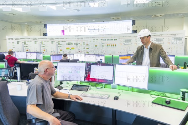 The Nossener Brücke CHP plant is a power plant in Dresden's Löbtau-Nord district that went into operation in 1995. The new building was built in 1993—1995 by Siemens AG with an electrical output of 270 megawatts and a district heating capacity of 455 megawatts and has been operated by Sachsenenergie ever since. Control room. The new power plant manager Martin Mallon, Dresden, Saxony, Germany