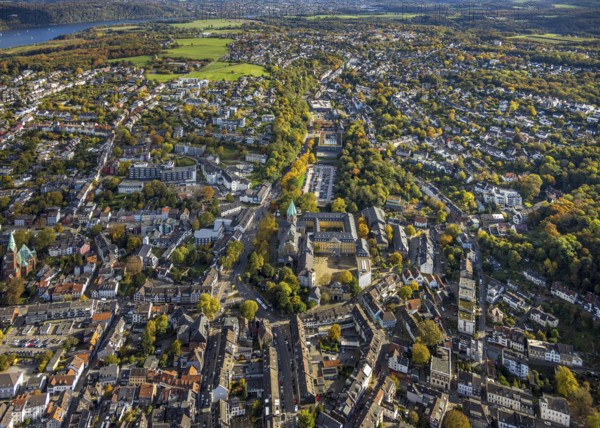 Aerial view, Catholic Basilica of St. Ludgerus and Folkwang University of Arts, St. Josef Hospital Essen-Werden GmbH, Mariengymnasium and residential area on Brückstraße, autumn trees, Werden, Essen, Ruhr region, North Rhine-Westphalia, Germany, place of worship, construction area, construction project, construction site, education, educational institution, DE, Essen-South, Europe, health care, religious community, God house, high school, holy place, college, hospital, church, parish, church tower, clinic, denomination, hospital, Hospital, teaching institute, aerial view, aerial photography, aerial photography, medical facility, medical aid, religion, place of worship, school center, overview, university, birds-eyes view, overview, medical care