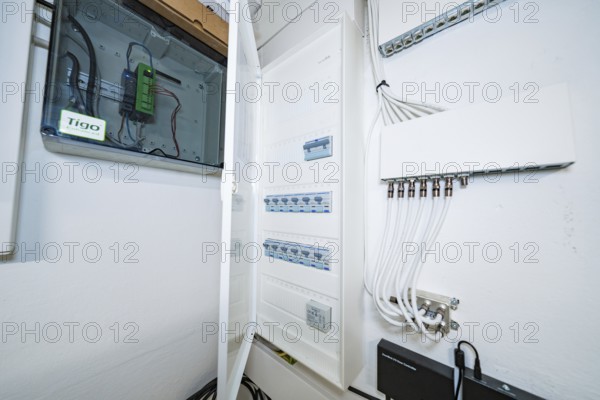 Open electrical distributor in bright technical room, house renovation, air conditioning renovation, Metzingen, Germany