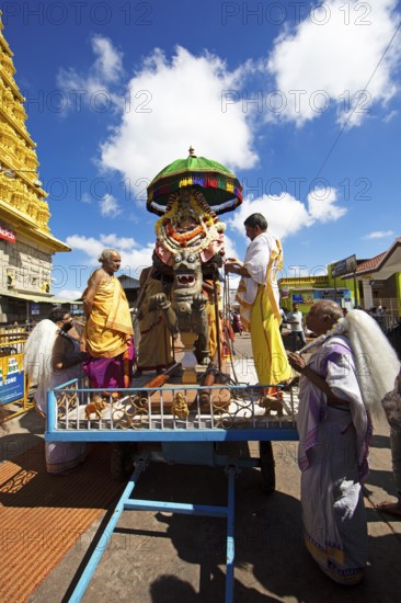 Puja at the Chamundeswar Hindu Temple on Chamundi Hill, Hindu monks prepare the chariot with the statue of a Hindu goddess, Mysore or Mysore, Karnataka, India