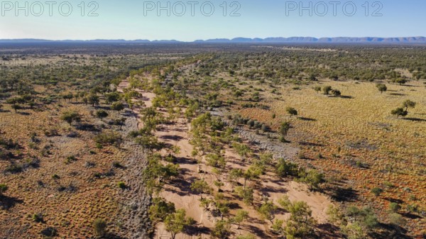 A dried out river bed in the Australian outback, photographed with a drone