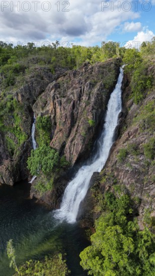 A waterfall and it´s pond in a remote are in Northern Territory Australia, photograped with a drone