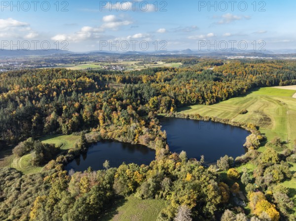 Aerial view of Lake Beech including Güttinger See, a swimming lake near Radolfzell am Lake Constance, on the horizon the Hegauberge Mountains, district of Constance, Baden-Württemberg, Germany