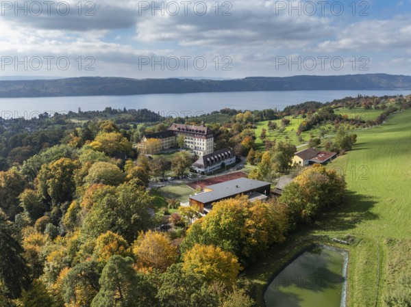 Aerial view of Lake Constance, Überlinger See, surrounded by autumn vegetation with Spetzgart Castle, Salem International College, Bodanrück on the horizon, Lake Constance District, Baden-Württemberg, Germany