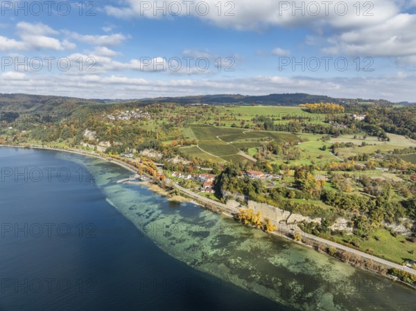Aerial view of Lake Constance with the village of Hödingen, above Überlingen, surrounded by autumn vegetation, Lake Constance district, Baden-Württemberg, Germany