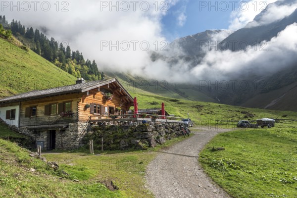 Dietersbachtal valley closure, left Alpe Dietersbach, Nebelschwanden hanging in the valley, mountains of the Allgäu Alps behind, Oberstdorf, Oberallgäu, Allgäu, Bavaria, Germany