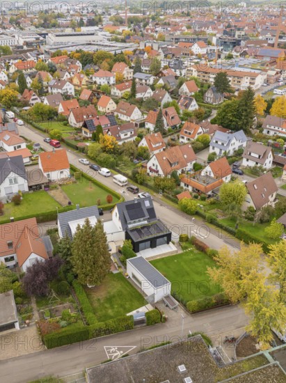 Residential area on the outskirts of town with modern and classic houses in an autumn atmosphere, Metzingen, Germany