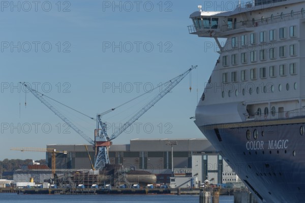 Bow of Norwegian Color Line ferry and cruise ship Color Magic, submarine under construction, armor, Thyssen Krupp subsidiary TKMS dock, cranes, Kiel port, Kiel Fjord, Schleswig-Holstein, Germany