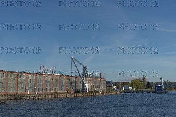 State capital Kiel, Friedrichsort district, building of the former company Maschinenbau Kiel, MaK, monument protection, economy, industry, crane, lighthouse Friedrichsort, Schleswig-Holstein, Germany
