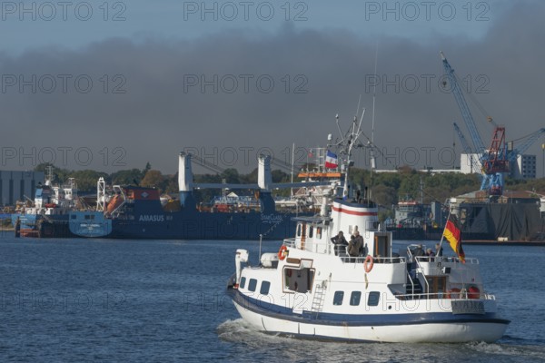 State capital Kiel, industry and shipyards in the Friedrichsort district, LINDENAU Werft GmbH, dock, cranes, conveyor ship, economy, industry, Germany flag, Schleswig-Holstein, Germany