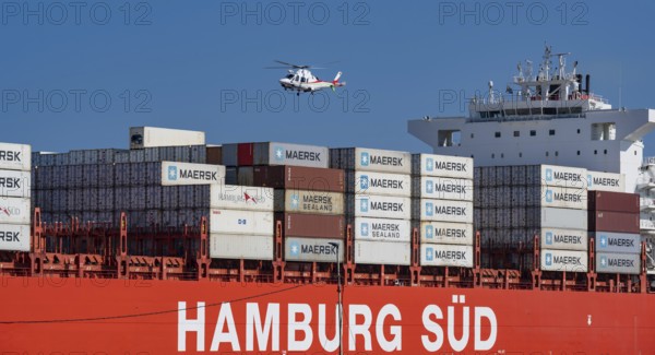 Container ship from the shipping company Hamburg Süd Santa Rita with container leaving the Indian Ocean South Africa Container ship from the shipping company Hamburg Süd Santa Rita with container when leaving the Indian Ocean South Africa