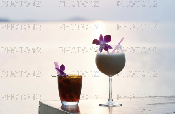 Coktails on the beach on sunset