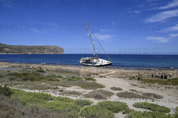 Stranded sailing yacht, storm, severe weather, Jávea or Xàbia, Alicante Province, Comunidad Valenciana, Spain