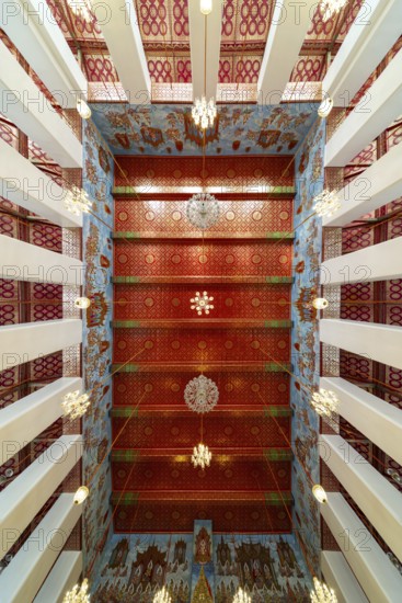 Photo from the frog persective:Ubosot (ordination hall) with columns (Sao) and richly decorated ceiling (Phra Phimarn) and crystal chandeliers, Rattanakosin architecture (Bangkok style), Wat Chana Songkhram, Phra Nakhon, Bangkok, Thailand