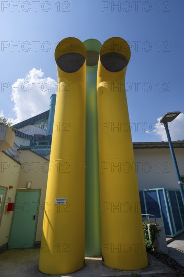 Colored vent pipes in front of Kurfürstenbad, outdoor pool, Amberg, Upper Palatinate, Bavaria, Germany