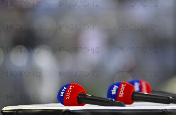Detailed view, SKY logo microphones lying on presentation table, German Classico, FC Bayern Munich FCB versus Borussia Dortmund BVB, Allianz Arena, Munich, Bayern, Germany