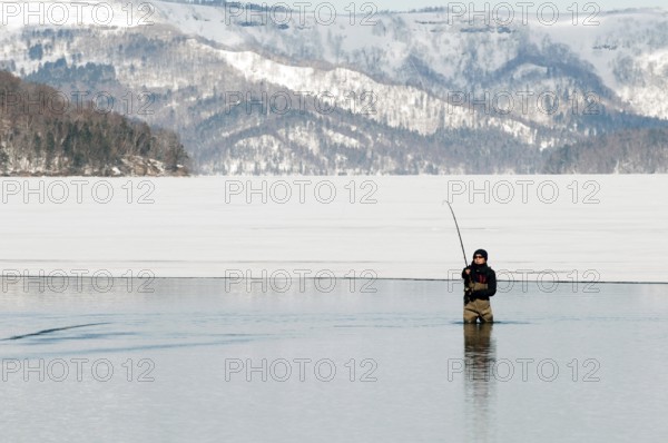 Japan, Hokkaido, Fisherman in winter Fisherman, winter, Frozen lake, Hokkaido, North, East, Winter, (Peche) Japan, 2017