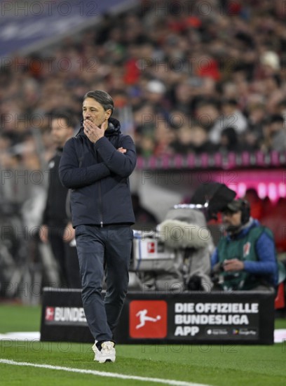 Coach Niko Kovac Borussia Dortmund BVB on the sidelines gesture gesture TV camera, thoughtful German Classico, FC Bayern Munich FCB versus Borussia Dortmund BVB, Allianz Arena, Munich, Bayern, Germany