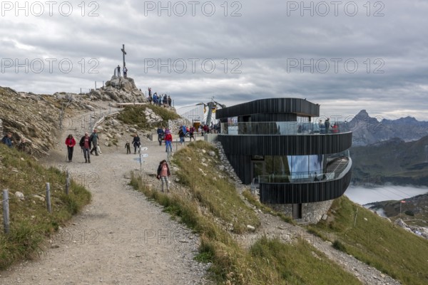 Nebelhorn summit with summit cross and summit restaurant, back right summit of Hochvogel, Oberstdorf, Oberallgäu, Allgäu, Bavaria, Germany