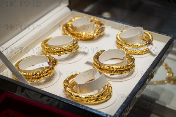 Customers purchase Gold jewelry at a store on the occasion of the festival of Dhanteras, in Guwahati, Assam, India on 18 October 2025. People rushing to buy gold even after its nearly 60% surge to record highs this year