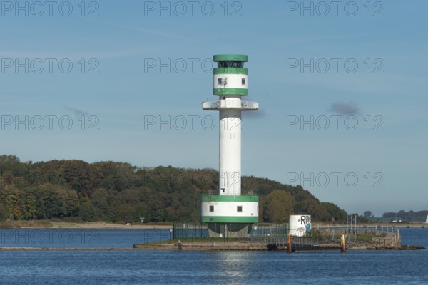 Green-white lighthouse Friedrichsort, Kiel Fjord, Kiel, shipping, tower, architecture, landmark, orientation, navigation, forest, blue sky, Schleswig-Holstein, Germany