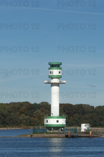 Green-white lighthouse Friedrichsort, Kiel Fjord, Kiel, shipping, tower, architecture, landmark, orientation, navigation, forest, blue sky, Schleswig-Holstein, Germany