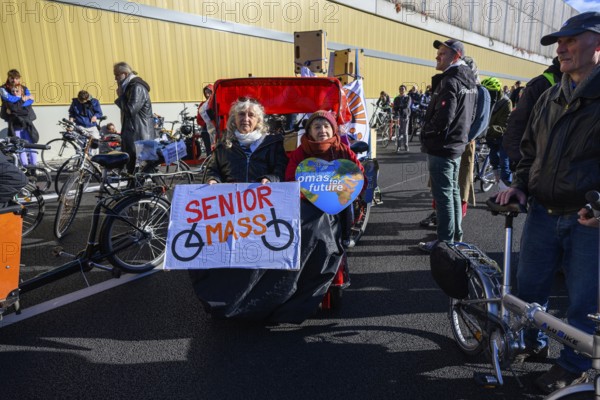 Senior women from Senior Mass and Grandmas for Future in bicycle rickshaw on A100 at a demo on the 16th construction phase of the A100. Berlin, 18.10.2025